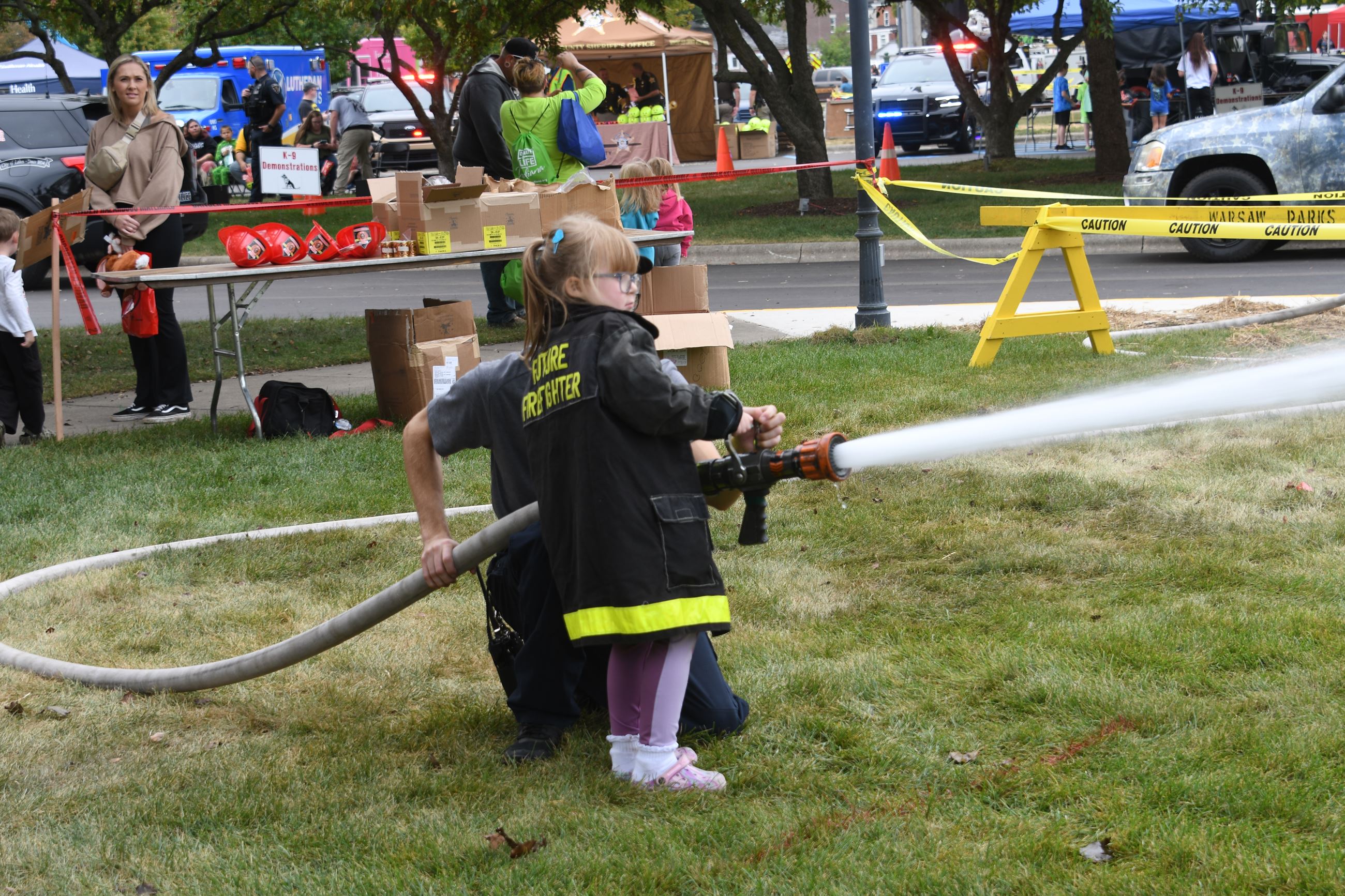 Child with fire hose